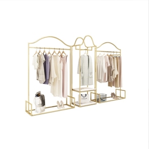 <span class=keywords><strong>Étagère</strong></span>s latérales dorées Nouveau centre commercial <span class=keywords><strong>Rail</strong></span> de vêtements Présentoir de magasin pour femmes Présentoirs combinés au sol - Product Image 1