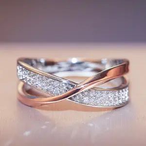 Huitan-anillo cruzado en forma de X de dos tonos para mujer, joyería de moda de boda, sortijas grandes y modernas de piedra CZ deslumbrantes