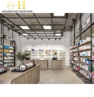 Comptoir de pharmacie en verre, style béton moderne, pour pharmacie à aménagement ouvert, avec étagères sur mesure