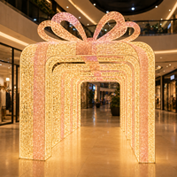 Arche lumineuse tunnel motif boîte cadeau de Noël extérieure grand format, homologuée IP65, très populaire pour la décoration des fêtes