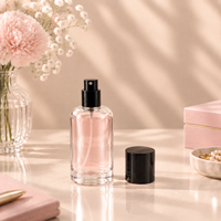Vente en gros de flacons atomiseurs de parfum en verre transparent épais de 50 ml, design à épaule ronde, impression personnalisée pour l'emballage cosmétique