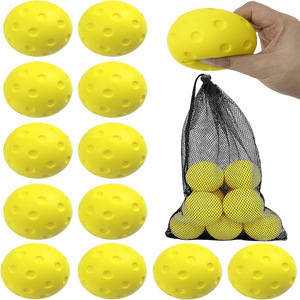 Pelota de ejercicio de 74 mm con 40 agujeros, amarilla, portátil, con bolsa de red, paquete de 12, para entrenamiento y alivio del estrés - Product Image 1