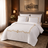 Ensemble de couette en coton blanc soyeux 100% brodé, housse de couette brodée, motifs de broderie pour une utilisation en chambre d'hôtel
