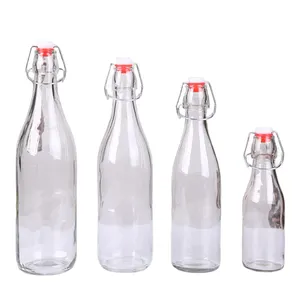 Bouteille d'eau en verre de silex personnalisé avec couvercle pivotant, meilleures ventes 2023 ml 500ml 750ml 16oz 24oz 32oz 1000ml