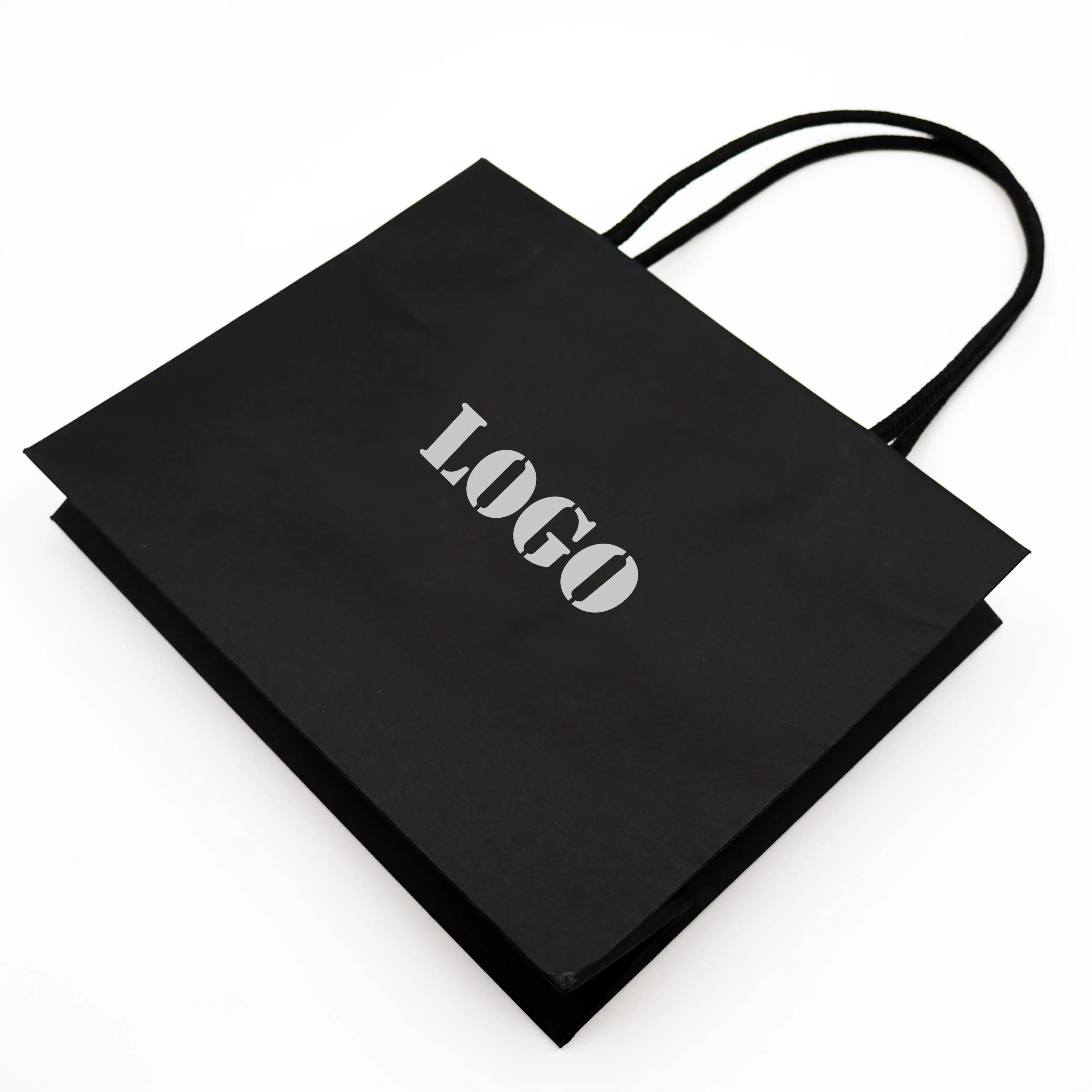 Şerit saplı özel logo tasarım lüks kağıt torba hediye paketleme torbası kağıt alışveriş torbası
