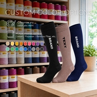 Nouvelles chaussettes hautes personnalisées unisexes noires à compression en fibre de bambou avec logo personnalisé