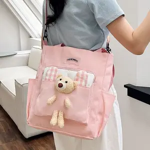 2023 Unisex borsa a tracolla di grande capacità fresca carina con ricamo orso doppio manico aperto piccolo orso fresco moda per bambini