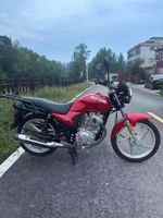 Moto utilitaire Haojue 125cc à moteur CG refroidi par air, vitesse maximale >80 km/h, super durable pour le transport de marchandises et les routes en montagne