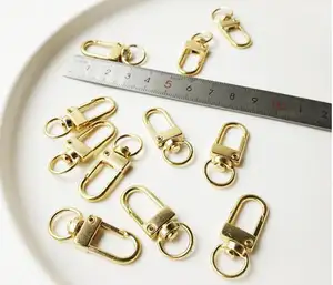 启发珠宝旋转扣金属连接器，用于钥匙扣和配件闪亮的夹克包龙虾扣带