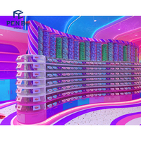 Présentoir de magasin de bonbons coloré personnalisé Étagères de vitrine de magasin de bonbons pour comptoir de magasin de bonbons