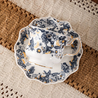 Ensemble tasse et soucoupe à café en porcelaine bleue et blanche rétro, motif floral, bordure dorée, style français, luxe léger, écologique, pour le thé
