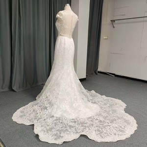 ANY243 Robe de mariée sirène moderne et glamour à manches courtes, avec broderie en dentelle, appliques florales en cristal, coupe ajustée et traîne chapelle longue - Product Image 3