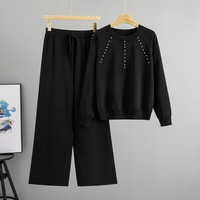 Nouvelle collection Printemps 2026 – Ensemble deux pièces en maille noire cloutée à col rond pour femme, avec pantalon large à cordon de serrage – Idéal pour le quotidien