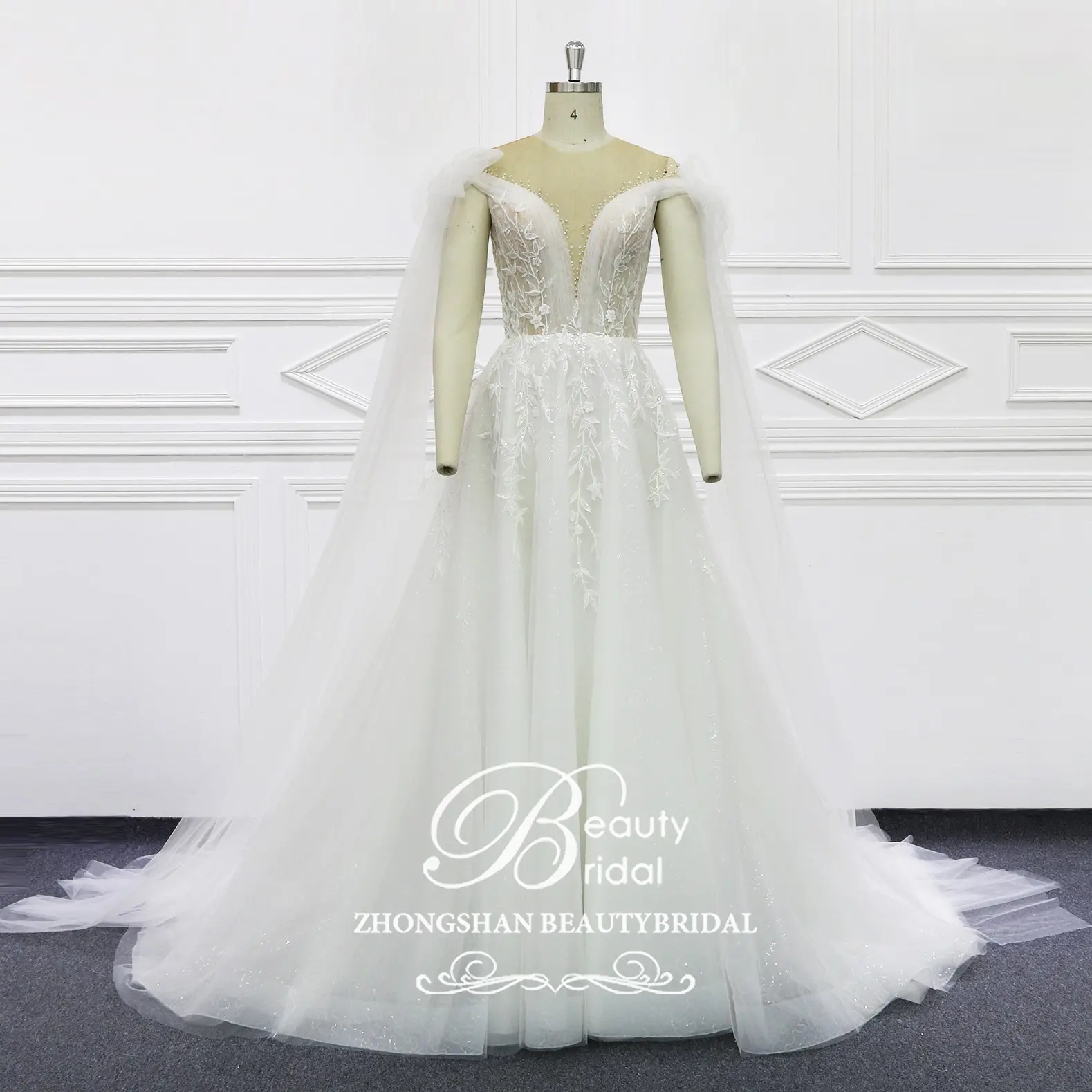 Nouveau style de robe de mariée de luxe une ligne de robe de mariée vente en gros en Chine avec perles lourdes à la main robe de mariée avec longue ceinture en tulle