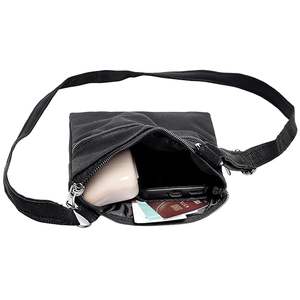 กระเป๋าสะพายคาดลำตัวผ้าฝ้ายกันน้ำสำหรับเดินทางสีดำทันสมัยพร้อมดีไซน์กันขโมยและปิดซิป - Product Image 6