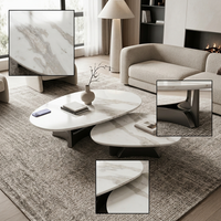 Ensemble de tables basses gigognes Luca Picasso en marbre blanc, forme de galet organique, base noire, mobilier de salon moderne de luxe
