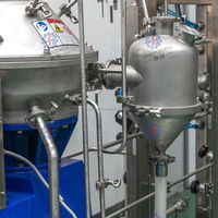 Séparateur à disques biphasé pour la classification du latex et de l'amidon