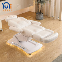 Table de massage électrique à 4 moteurs inclinable et rotative en cuir avec appui-tête fixe pour salon de beauté