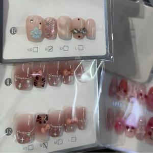 Faux ongles à presser, motifs aléatoires, 10 pièces/ensemble, haute qualité, uniques pour les fêtes - Product Image 5