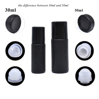 Bouteille à bille en verre noir portable de 30ml avec boule de massage en plastique Récipient d'aromathérapie d'huile essentielle vide rechargeable de 50ml