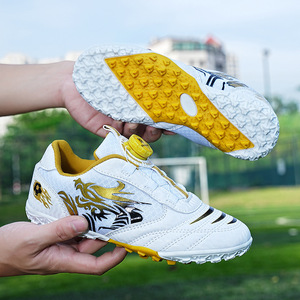 Chaussures de football pour enfants à boucle rotative, tige synthétique, doublure en maille, semelle extérieure en caoutchouc, semelle intermédiaire en EVA, crampons de football pour l'entraînement de printemps - Product Image 1