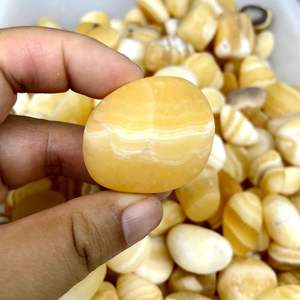 <span class=keywords><strong>Pietra</strong></span> burattata di <span class=keywords><strong>Calcite</strong></span> arancione di Spar islandese di miele giallo all'ingrosso in vendita - Product Image 3