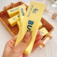 Vente en gros de jouets anti-stress en mousse PU à rebond lent, en forme de bâton de beurre Kawaii, à remontée lente, à presser et moelleux pour enfants et adultes