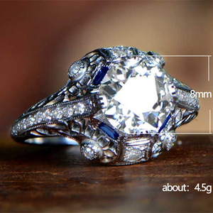 Anello di fidanzamento da donna in platino con diamante taglio brillante rotondo, zaffiro naturale colore D e pietre laterali F771 - Product Image 5