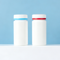 Bouteille de complément alimentaire en HDPE blanc, avec fermeture côtelée bleue et rouge, forme ronde, récipient vide pour le stockage de comprimés et de capsules