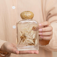 Diffuseur à bâtonnets en verre avec fleurs séchées préservées et paillettes dorées, ornement aromatique longue durée pour la décoration de chambre