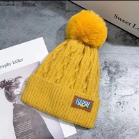 Gorro de Lana de Invierno para Niños al por Mayor, Transpirable y Cálido en Color Sólido, con Orejeras a Prueba de Viento y Efecto Estilizador para Cabezas Grandes