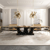 Table à manger élégante et luxueuse en aluminium coulé plaqué or avec une structure unique pour la maison et l'hôtellerie