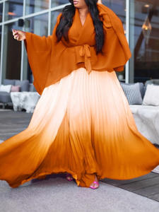 Derniers modèles de tenues africaines d'automne pour femmes <span class=keywords><strong>Haut</strong></span> irrégulier à lacets <span class=keywords><strong>et</strong></span> <span class=keywords><strong>jupe</strong></span> plissée dégradée Ensemble deux pièces vêtements pour femmes - Product Image 6