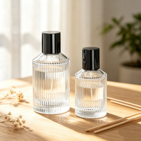 Flacons de parfum en verre transparent à rayures rondes de haute qualité, 30 ml et 100 ml, avec couvercle sérigraphié pour emballage de parfum, boîte cadeau