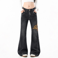 Jean délavé style américain haut de gamme, coupe micro-évasée et jambe large, design unisexe, pantalon slim