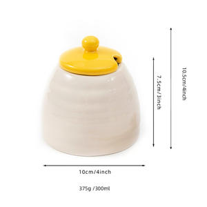 Tarro de miel de cerámica con tapa y cuchara, diseño de abeja blanca, contenedor redondo para almacenamiento de alimentos para uso en la cocina. - Product Image 3