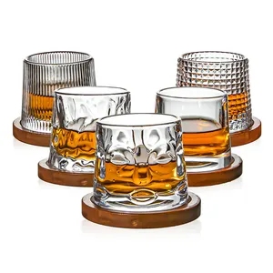 Vaso Vintage creativo para aliviar el estrés, vaso giratorio de 360 grados con relieve, vaso de whisky de vidrio con Base de madera