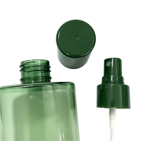 Flacon pulvérisateur PET vert rond en promotion avec couvercle intégral et pulvérisateur à brume fine pour toner et soins de la peau, personnalisable