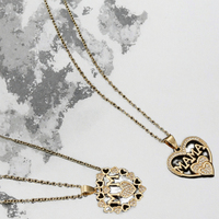 Collier tendance pour femme avec pendentif cœur creux en alliage et chaîne superposée