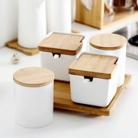 Ensemble de condiments japonais pour bouteilles d'huile ménagers boîte d'assaisonnement moderne et simple en céramique avec couvercle et plateau en bois