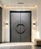 Porte d'entrée double en fonte d'aluminium YDNCN avec relief circulaire sculpté, panneau texturé mat, style villa européenne classique, résistant à l'eau