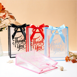 Sacs cadeaux réutilisables transparents en PP avec poignées, rubans et nœuds pour Noël, Pâques, mariages, baptêmes de bébé, anniversaires - En stock - Product Image 2