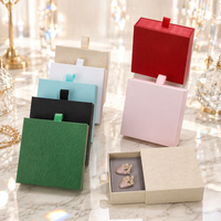 Boîte cadeau en papier magnétique noire personnalisée avec logo, emballage de bijoux, et boîte intérieure octogonale en velours, très populaire pour la vente en gros