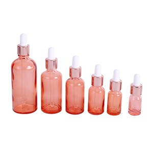 ขวดแก้วหยดสีโรสโกลด์ขนาด 5-100 มล. พร้อมฝาเกลียวสีชมพู สำหรับบรรจุน้ำมันหอมระเหย เครื่องสำอาง และน้ำหอม (ตัวอย่างฟรี) - Product Image 1