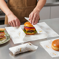 Papier d'emballage alimentaire jetable écologique imperméable en PE imprimé avec logo personnalisé, résistant à la graisse, pour poulet frit, hamburgers, sandwichs