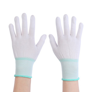 Guantes de trabajo de nailon blanco de 13 agujas, antideslizantes, reutilizables, para tareas en ambientes secos - Product Image 1