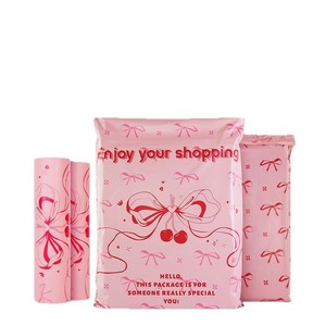 Bolsa de mensajería rosa con estampado de lazo, impermeable y autosellable para embalaje de compras - Product Image 1