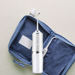 Jet d'eau dentaire intelligent <span class=keywords><strong>sans</strong></span> <span class=keywords><strong>fil</strong></span> B2B pour l'élimination profonde de la plaque Design compact pour les soins bucco-dentaires quotidiens à faible quantité minimale de commande - Product Image 1