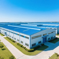 Entrepôt à structure en acier de bonne durabilité et doté d'un espace intérieur spacieux, avec une construction en acier préfabriquée conçue pour le stockage en vrac