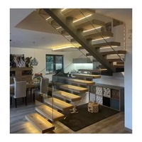 Escalier résidentiel en acier moderne avec marches LED intelligentes, design en L, marches flottantes intelligentes